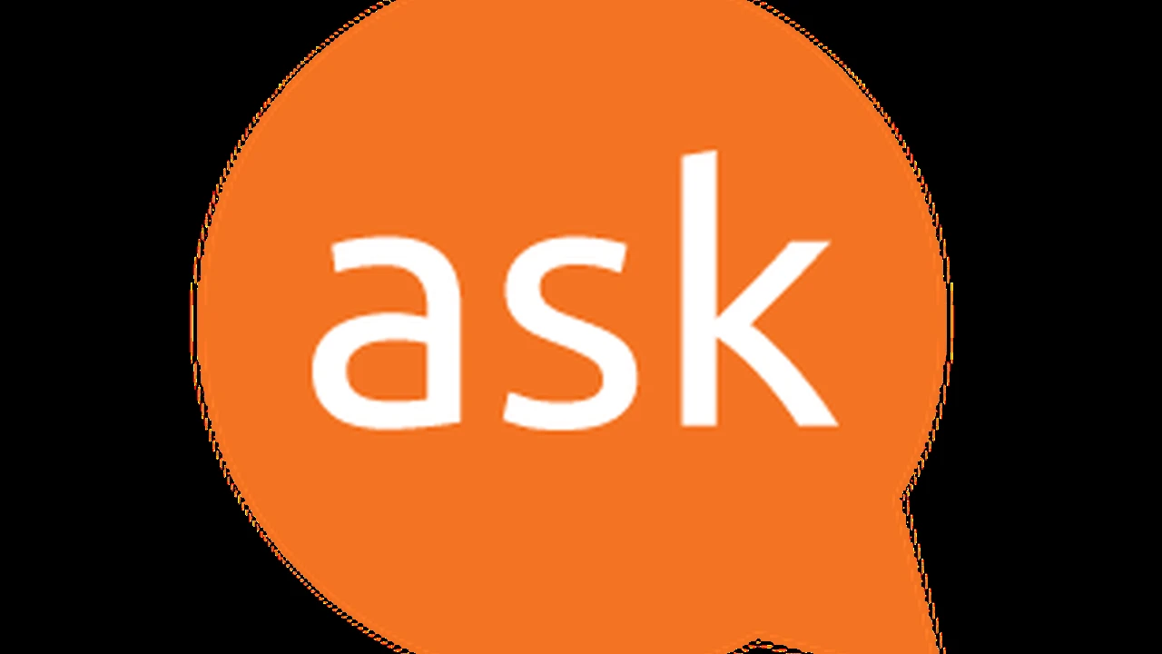 Close up on a plate of mashed potatoes, topped with baked pork chops with cream of mushroom soup, and a side of green beans.