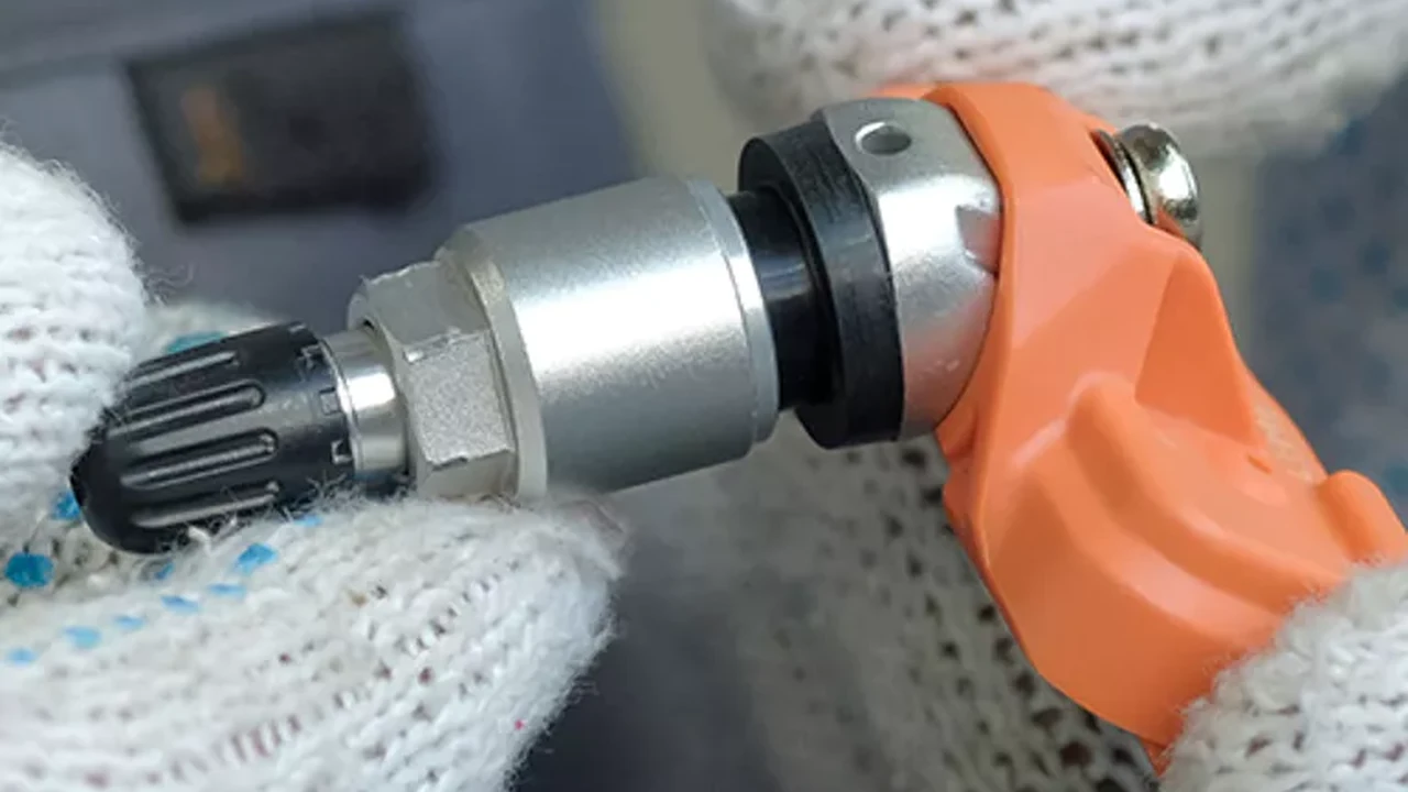 Close up on a plate of mashed potatoes, topped with baked pork chops with cream of mushroom soup, and a side of green beans.