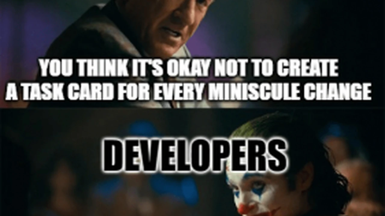 Close up on a plate of mashed potatoes, topped with baked pork chops with cream of mushroom soup, and a side of green beans.