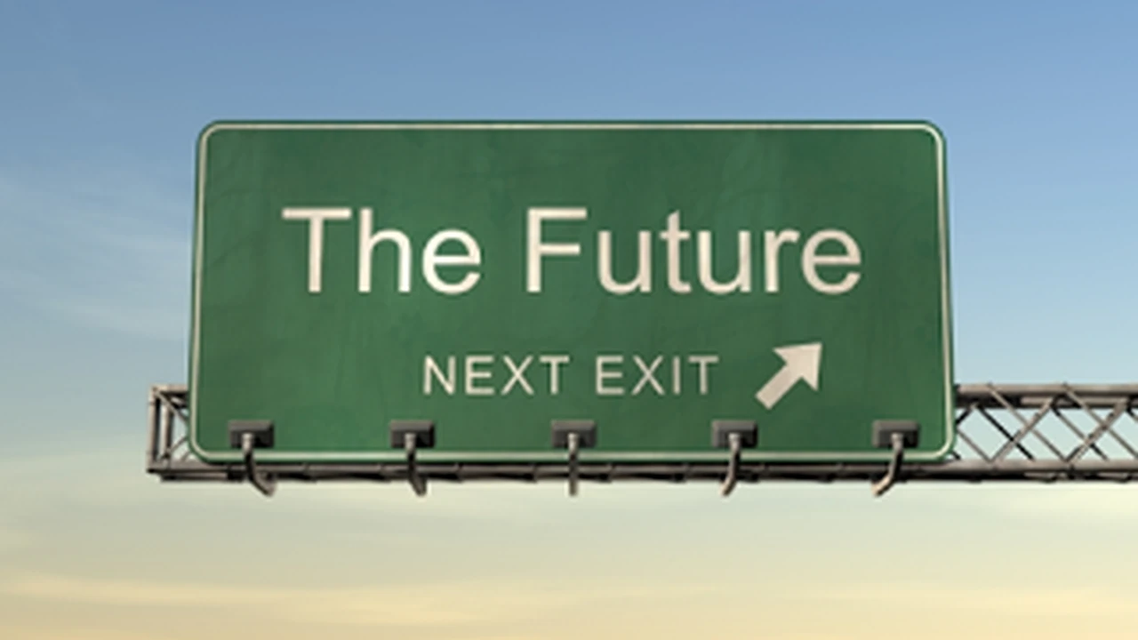 Close up on a plate of mashed potatoes, topped with baked pork chops with cream of mushroom soup, and a side of green beans.